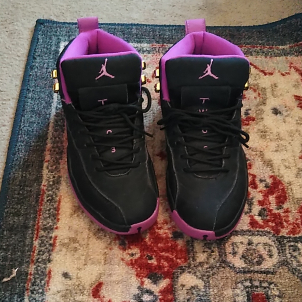 Jumpman Jordans black and purple size 8.5